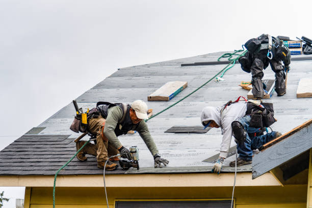 Professional Gutter Installation technician working in Gilford, NH